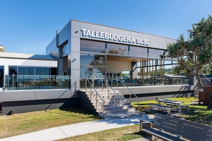 Modern beachfront dining at Tallebudgera Surf Club — one of the top Palm Beach restaurants offering ocean views, classic Aussie meals, and a laid-back coastal vibe.
